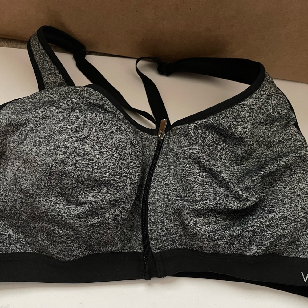 Pink Victoria’s Secret sports bra in new condition 38c